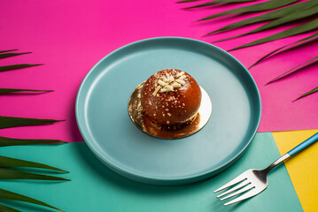 Gourmet Bun with a Fork on a Stylish Plate