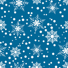 Seamless pattern of white snowflakes and dots on a blue background. Winter and holiday-themed design. Perfect for festive Christmas decor. Vector illustration