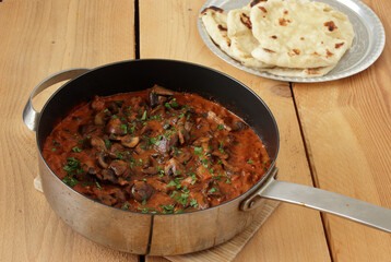 mushroom curry with naan bread