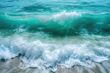 Beautiful natural texture of rolling sea waves surf with white foam and clear water with turquoise and green hueshigh