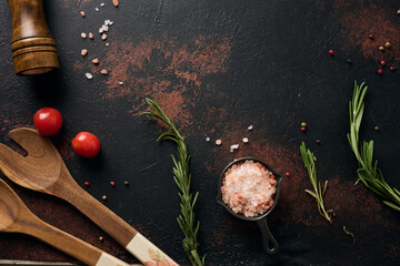 Culinary composition with kitchen utensils and spices, Himalayan salt, colorful peppercorns, fresh...