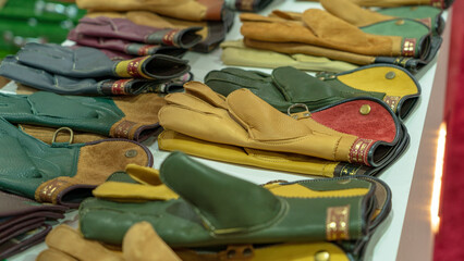 Falconry Gloves Displayed at a Stall