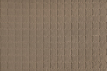 Naklejka premium Checkered stitching pattern, brown quilted fabric background. Blanket stitch square texture