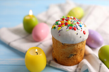 An Easter cake adorned with colorful sprinkles and candles, perfect for a festive celebration