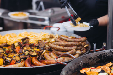 Food festival with food stall kiosk, open-air outdoor fair market, assortment of different...
