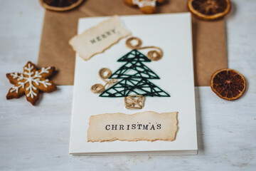 Concept of Christmas scrapbook, handmade postcard, holiday family leisure activity, crafting....