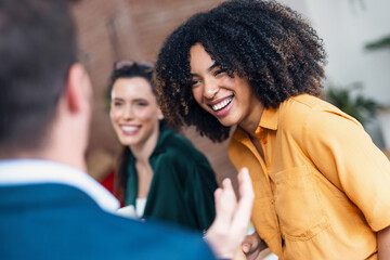 Business people taking a break of work while drinking a cup of coffee in conference room at modern startup