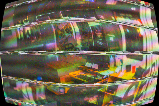 A colorful retro CRT screen displaying distorted surveillance footage, creating a glitchy, nostalgic effect reminiscent of old CCTV systems - messy office
