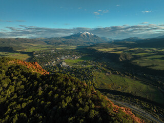 Naklejka premium Aerial view of snow topped Mount Sopris near Carbondale, Colorado USA