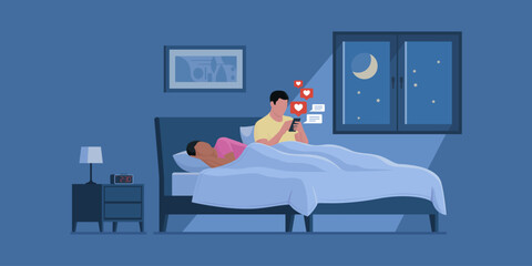 Man connecting on social media at night while his wife is sleeping