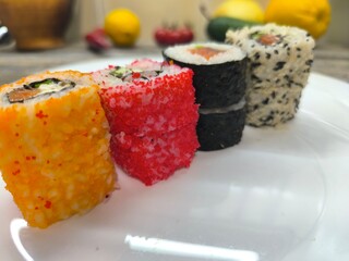 selection of fresh sushi on a white plate.High quality photo