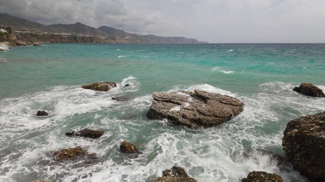 ocean sea waves breaking on the rocks