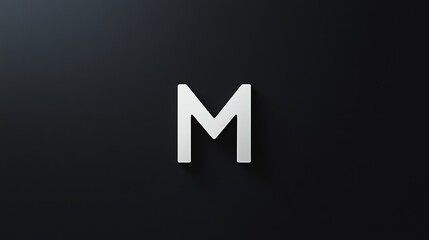 White capital letter M with a soft shadow on a dark background.