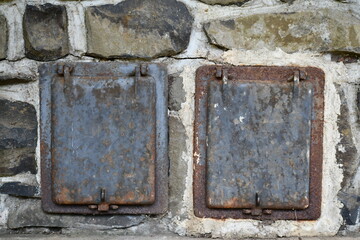 Wood fired oven doors at state park picnic structure.