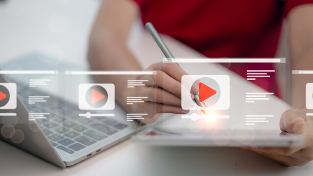 Women search for video content on internet, to watch online entertainment streaming, watch online streaming video. online learning, watch video and live, listen to music, shows or online lessons.