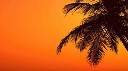 Silhouette of palm tree against stunning sunset sky