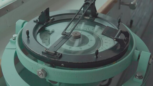 Close up of a gyroscope compass on the bridge of a tanker
