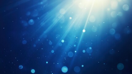 Abstract light flares shimmering over a deep blue gradient background, evoking a sense of depth.