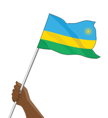 hand holding a waving rwanda flag vector
