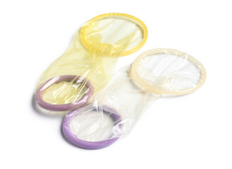 Open female condoms isolated on white background