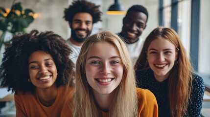 Obraz premium Group of Young Friends Smiling Together in a Bright Space