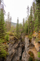 Incredible Maligne Canyon in Jasper National Park during spring time with unreal scenic Canadian views in the Rockies of Canada. Scenic nature view in popular tourism, tourist spot. 