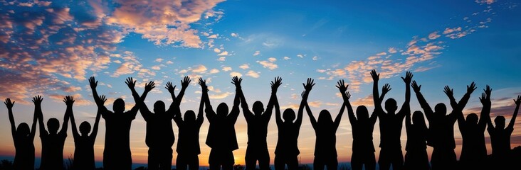 Silhouettes of People with Arms Raised Against a Sunset Sky