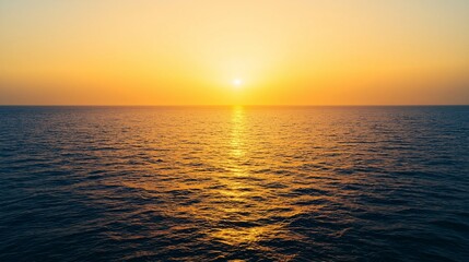 Naklejka premium Serene Sunset Over Calm Ocean Waters