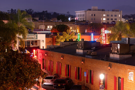 Fullerton, California, USA - September 28, 2024: Twilight descends on the SOCO nightlife district of restaurants and bars.