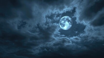 Full Moon Shining Through Clouds in a Dark Night Sky