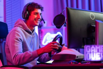 Caucasian young esport male gamer play online video game on computer.  © Kawee