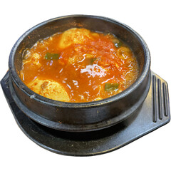 A steaming bowl of sundubu jjigae, a Korean spicy soft tofu stew. The dish is traditionally served in a stone pot, keeping the stew hot.