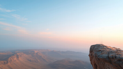 Obraz premium Stunning mountain view with soft pastel sky at dawn, serene and tranquil atmosphere.