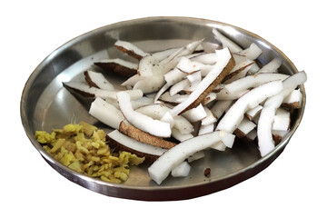Coconut and Ginger cut into pieces for puja offerings