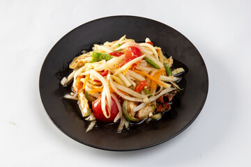 Som Tum Thai - Papaya Salad on a white background