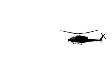 Silhouette of a Helicopter in Flight