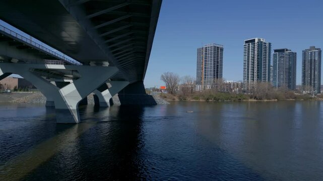 High Rise Residential View From Champlain Bridge Over The Saint Lawrence River At Nuns' Island In Montreal, Quebec, Canada. aerial, mid-shot