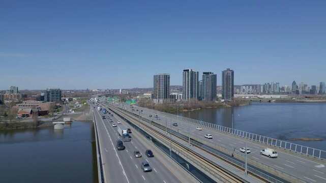 Under Construction Of Residential Tower View From Champlain Bridge At Nuns' Island In Montreal, Canada. aerial, approaching shot