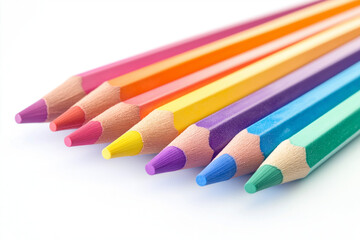 Fototapeta premium Vibrant Art Tools: An Arranged Collection of Watercolor Pencils in Spectrum Order
