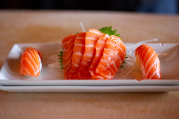 Plate of Salmon slices and Nigiri sushi