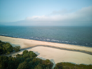 
Seaside town of Jelitkowo, buildings with beach and sea.