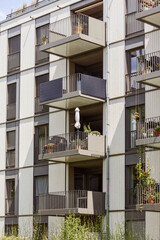 Modern Residential Building Exterior. Green Apartments Modern Eco Apartment Building with Wood...