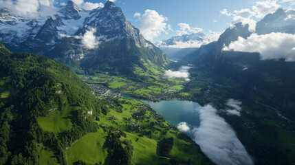 A stunning aerial view of Interlaken, with its green valleys, lakes, and surrounding mountains.