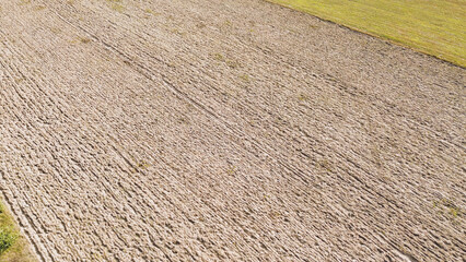 Overhead capture of a plowed field showing empty, ready soil