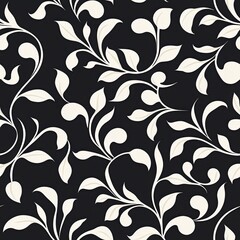 A decorative black and white floral pattern featuring swirling vines and leaves.