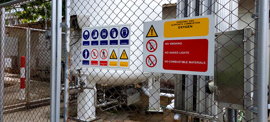 Icon on the warning sign indicates caution when entering a hazardous  area sign.