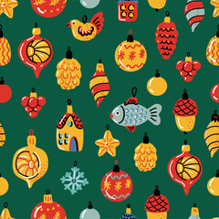 Vintage Christmas seamless pattern. Retro Christmas decoration on green background. Christmas bauble in the shape of pinecone, fish, acorn, star, bird. 