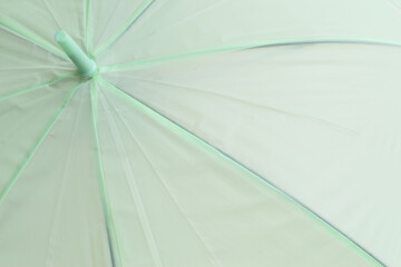 surface of open green umbrella background