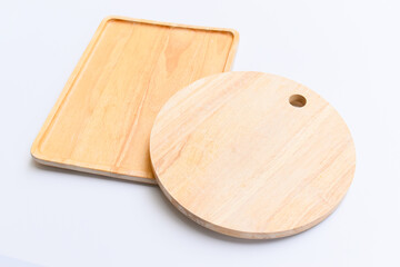 brown wooden tray and sphere cuttingboard isolated on white background