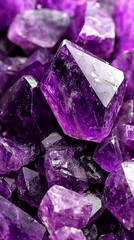 Fototapeta premium A tall stack of purple crystals atop smaller stacks